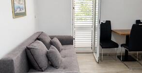 Svijetli dnevni i trpezarijski dio apartmana